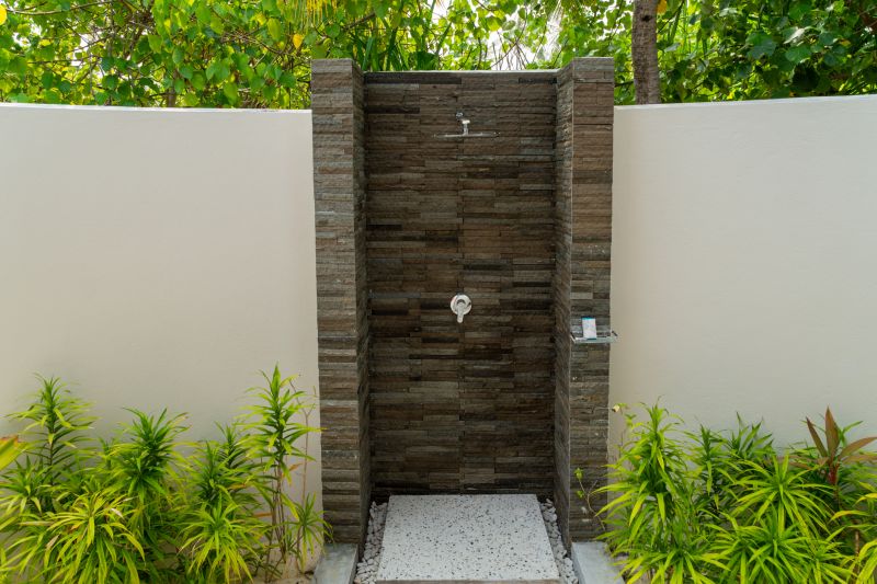 Open-Concept Shower with Natural Stone